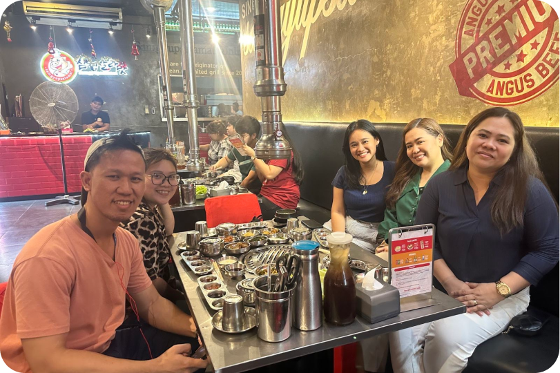A group of people gathered around a samgyupsal table, with John Lester Atienza of Mulder Kampman Design at the leftmost.